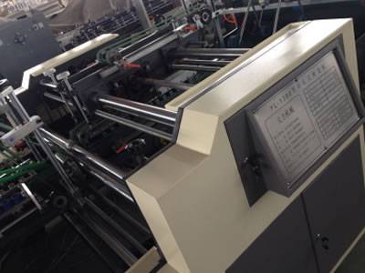 Automatic folder gluer with lock bottom function